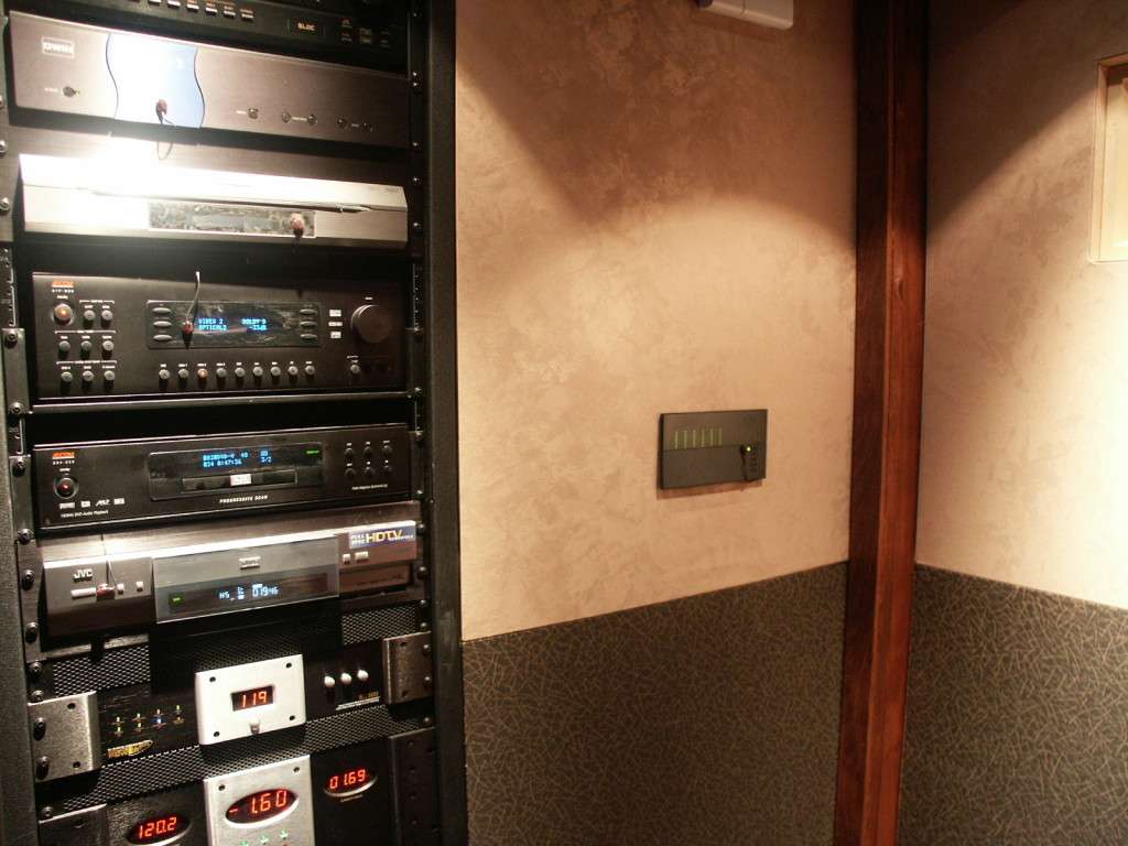 Rack of audio and video gear in a closet